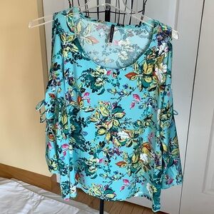 Vibrant Floral Women's Blouse With Unique Cutouts